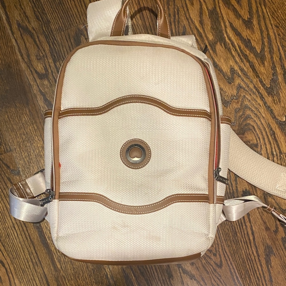 DELSEY Paris Neutral Cream Canvas Backpack with Tan Trim